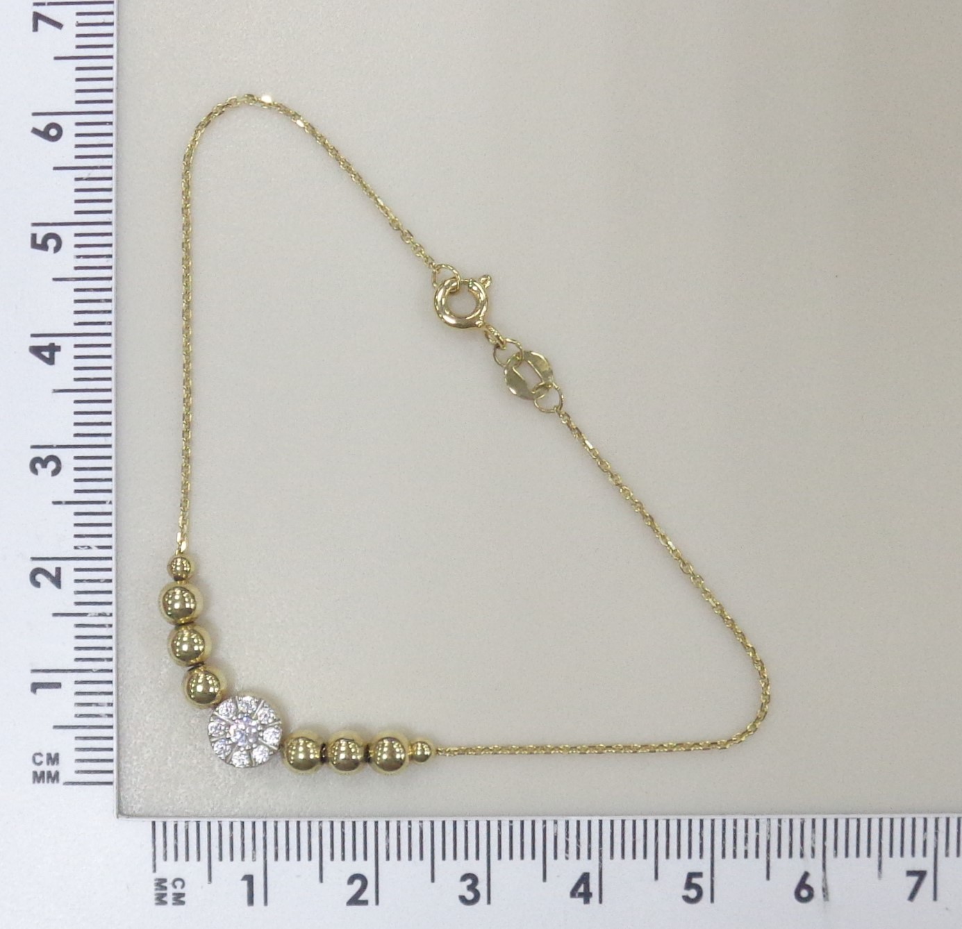 Золотой браслет 585 пробы; желтое золото; плетение Якорное; родий; вставки 9 Фианит бесцв.;